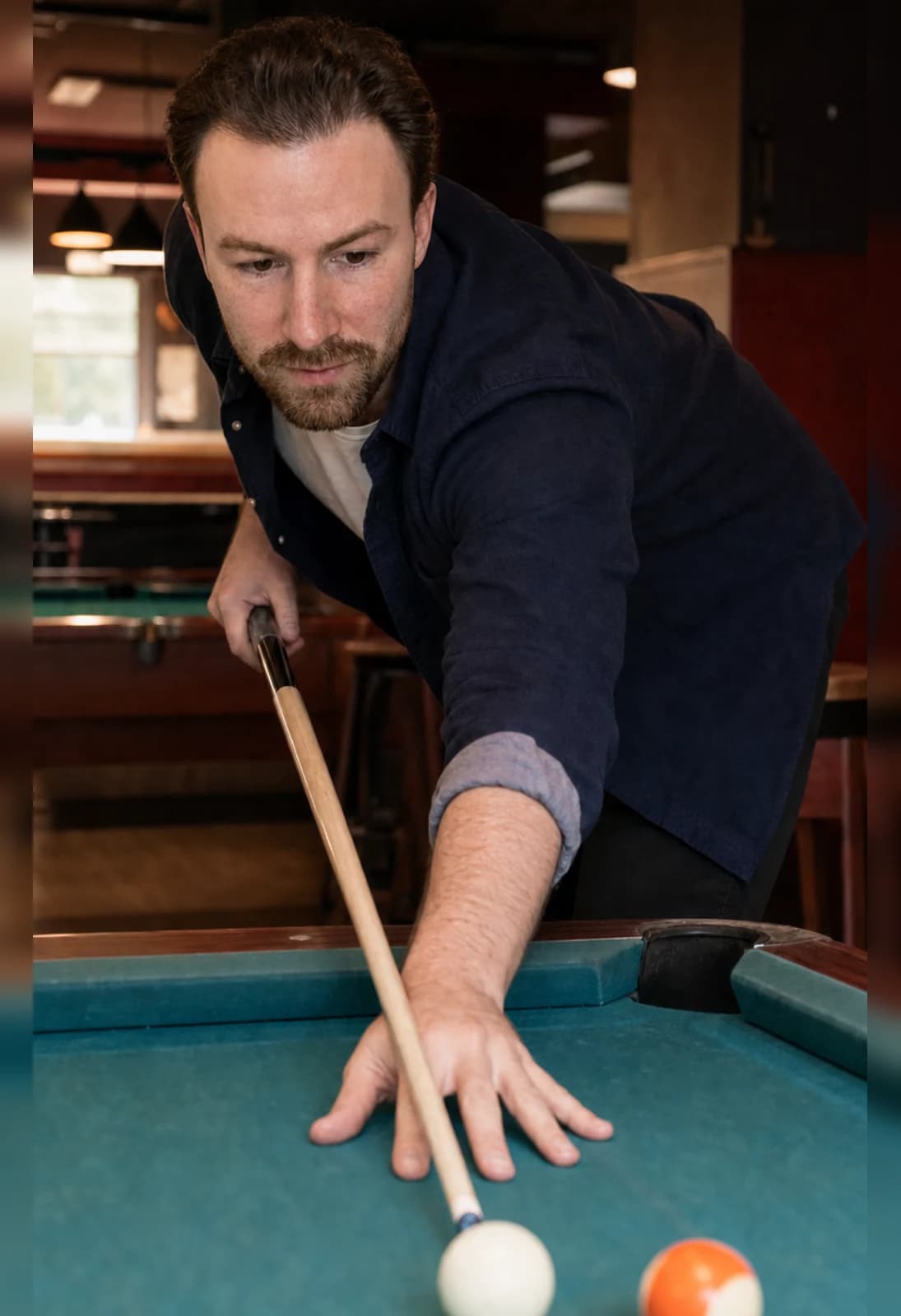 A man playing pool
